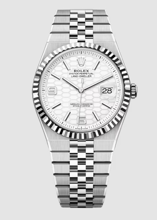 Rolex White Honeycomb Dial Land-Dweller Mens Watch Ref 127334 With Flat Jubilee Bracelet: Rolex White Honeycomb Dial Land-Dweller Mens Watch Ref 127334 With Flat Jubilee Bracelet This Rolex Land-Dweller features a distinctive white honeycomb dial paired with a fluted bezel and a flat Jubil