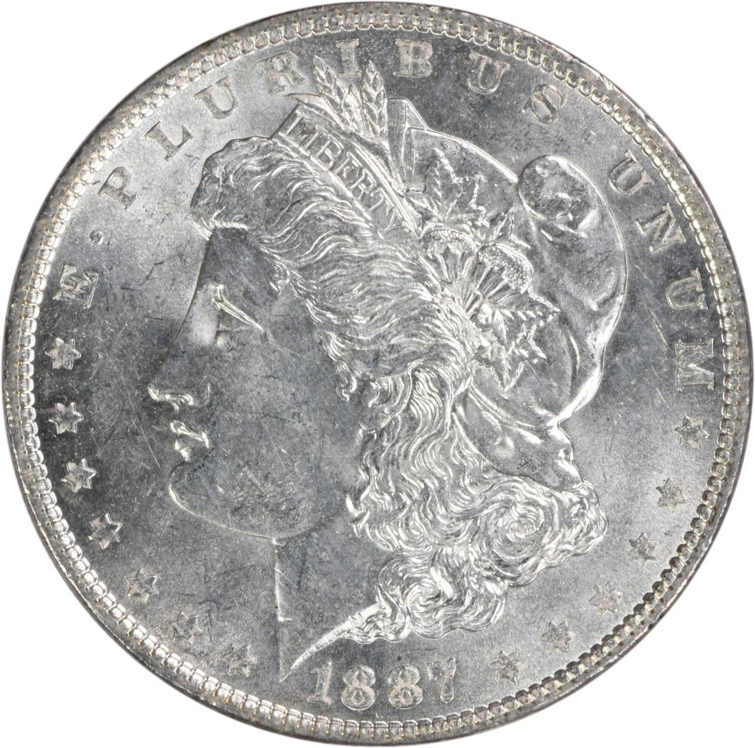 Choice BU 1887 Silver Dollar Morgan Uncertified No Mint Mark: Choice BU 1887 Silver Dollar Morgan Uncertified No Mint Mark This 1887 Morgan Silver Dollar is a Choice Brilliant Uncirculated (BU) coin from the United States, composed of silver and with no mint mar