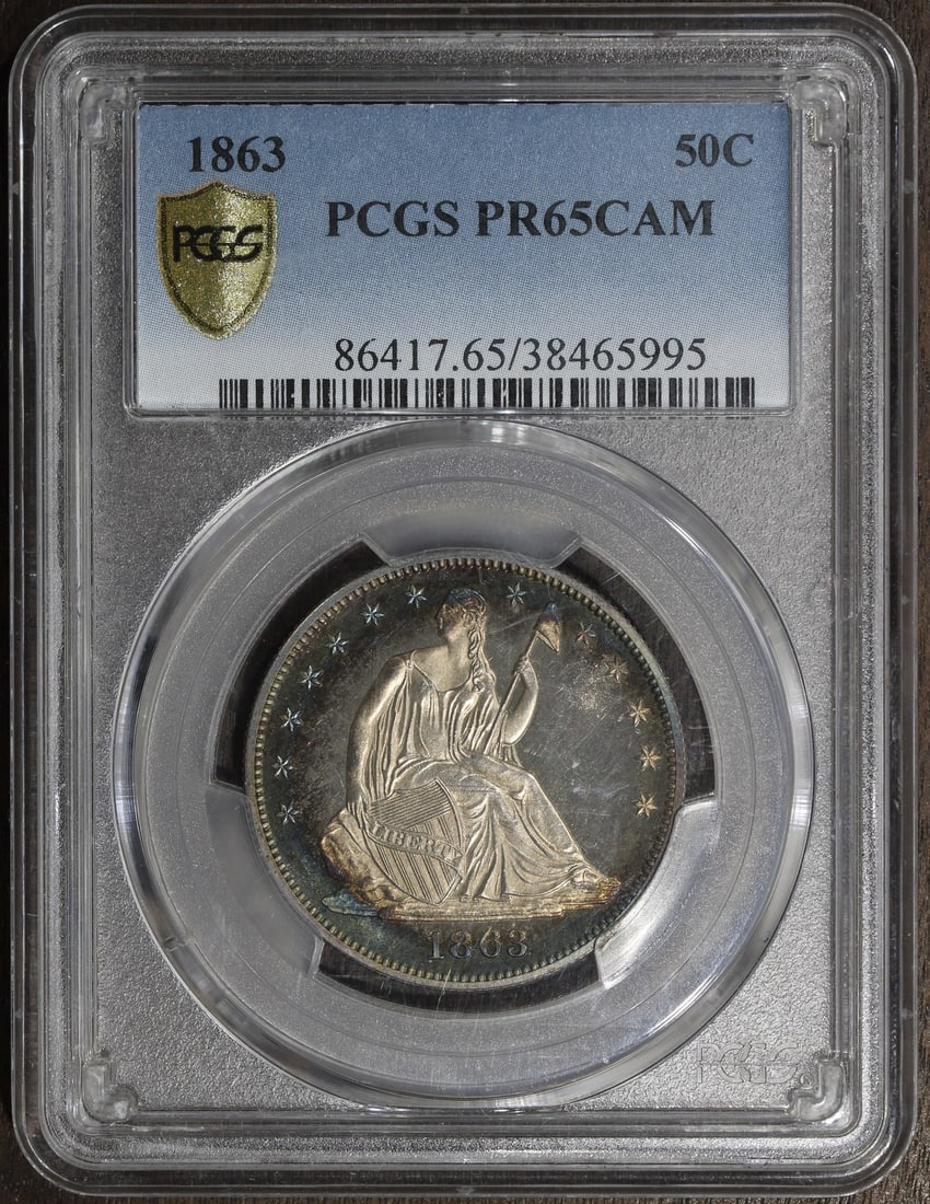 1863 Seated Liberty 50C Proof PCGS PR65 Cameo Silver: 1863 Seated Liberty 50C Proof PCGS PR65 Cameo Silver This 1863 Seated Liberty Half Dollar is a proof strike with a PR65 Cameo grade, offering impressive eye appeal and great toning. Minted in Philadel
