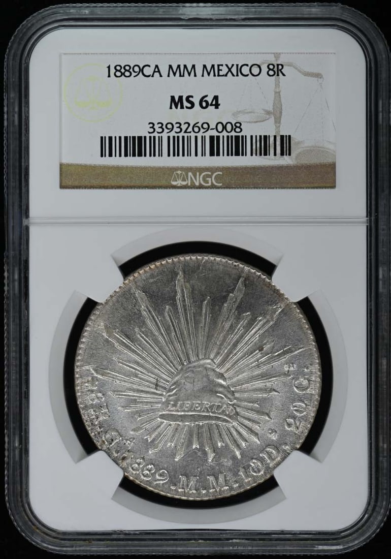 1889 Mexico 8 Reales Coin NGC MS64 Uncirculated: 1889 Mexico 8 Reales Coin NGC MS64 Uncirculated This 1889 Mexico 8 Reales coin is graded MS64 by NGC, ensuring its uncirculated condition. With a certification number of 3393269008, this piece is a re