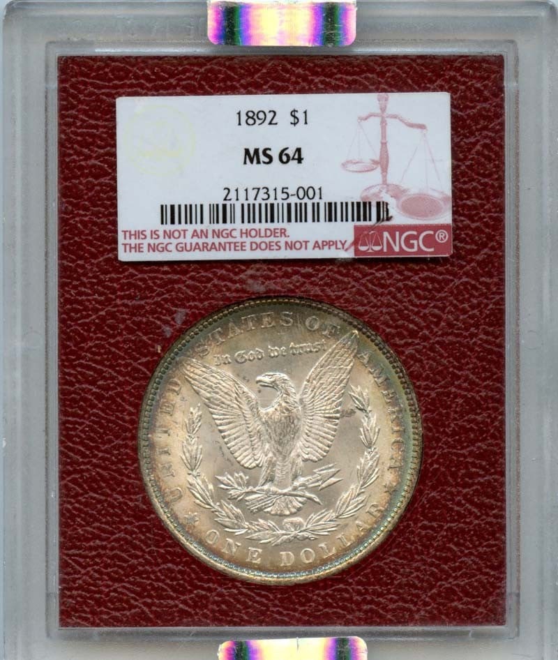 NGC MS64 1892 Morgan Silver Dollar Philadelphia Mint Uncirculated: NGC MS64 1892 Morgan Silver Dollar Philadelphia Mint Uncirculated This is an 1892 Morgan Silver Dollar from the United States, minted in Philadelphia. The coin is certified by NGC with a grade of MS64