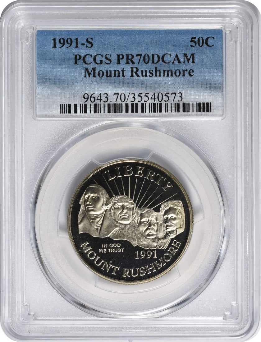 PCGS PR70DCAM 1991-S Mount Rushmore clad half dollar proof: PCGS PR70DCAM 1991-S Mount Rushmore clad half dollar proof This is a 1991-S Mount Rushmore Commemorative Half Dollar, graded PR70 Deep Cameo by PCGS. The coin is uncirculated and features a proof stri