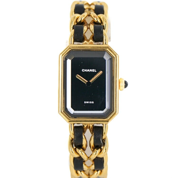 CHANEL Premiere H0001 Quartz Gold Leather Wristwatch: CHANEL Premiere H0001 Quartz Gold Leather Wristwatch This Chanel Premiere M H0001 women's wristwatch features a gold-plated and leather case and band, complemented by a black dial. Powered by a quartz