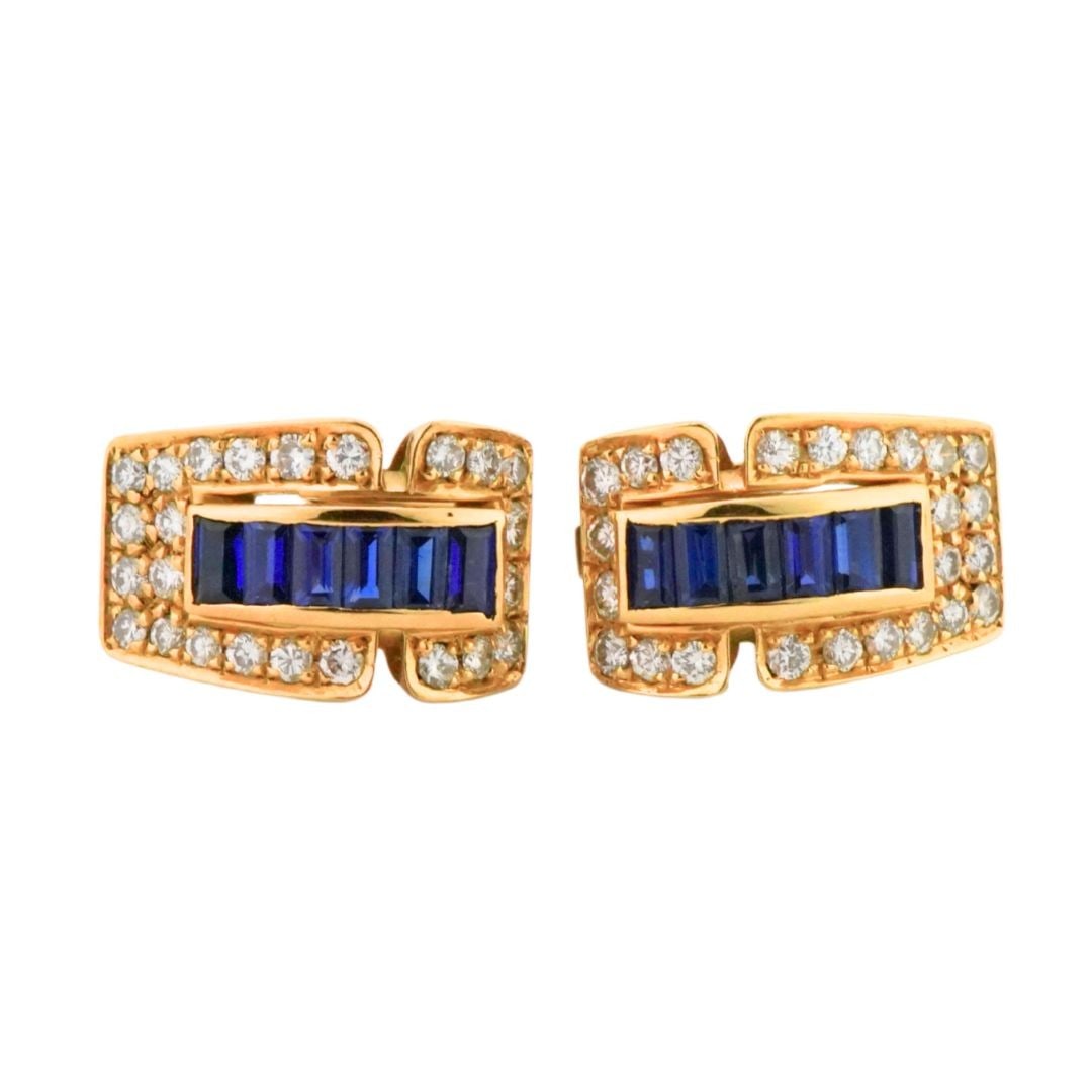 Art Deco 18K Yellow Gold Huggie Sapphire Diamond Clip Earrings: Art Deco 18K Yellow Gold Huggie Sapphire Diamond Clip Earrings These elegant Art Deco-style huggie earrings are crafted from 18k yellow gold and feature a total of twelve deep blue, genuine sapphires 