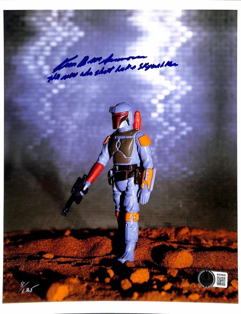 Beckett Authenticated Kim D.M. Simmons Boba Fett Signed 8 1/2 x 11 Photo: Beckett Authenticated Kim D.M. Simmons Boba Fett Signed 8 1/2 x 11 Photo This is an 8 1/2 x 11 inch photograph featuring a vintage Boba Fett action figure from Star Wars, hand-signed by photographer K