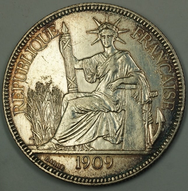 1909 French Indochina silver piastre coin: 1909 French Indochina silver piastre coin This is a 1909 A French Indochina Silver Crown Piastre coin issued by France. The coin is from the year 1909 and remains uncertified. It is in pre-owned condi