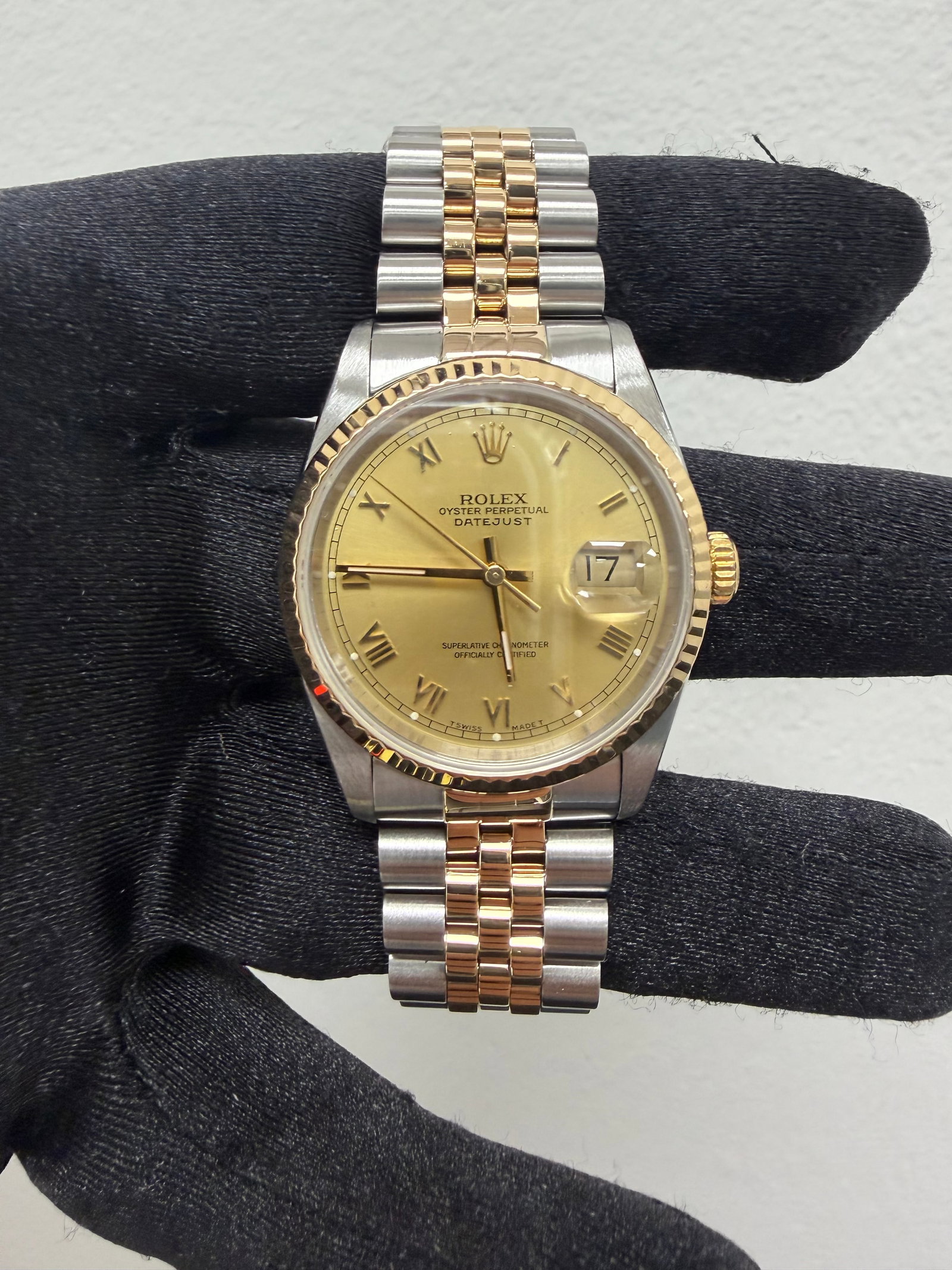 Rolex Datejust 36 Champagne Roman Dial Jubilee Watch Ref 16233: Rolex Datejust 36 Champagne Roman Dial Jubilee Watch Ref 16233 This Rolex Datejust 36 features a champagne Roman dial, fluted bezel, and Jubilee bracelet. The watch is designed for men and is part of 