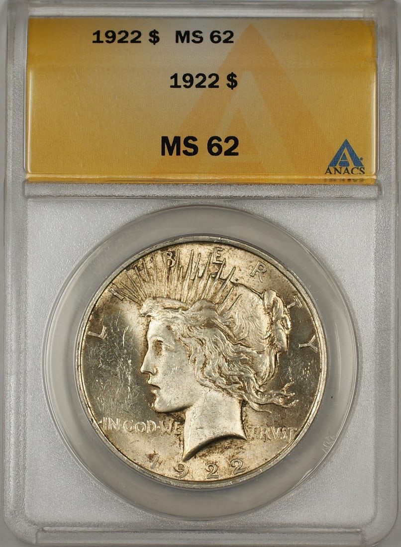 ANACS MS-62 1922 Peace Dollar Uncirculated Silver with Toning: ANACS MS-62 1922 Peace Dollar Uncirculated Silver with Toning This 1922 Peace Silver Dollar features a certified ANACS grade of MS-62 and displays attractive toning. Minted in Philadelphia, it is comp
