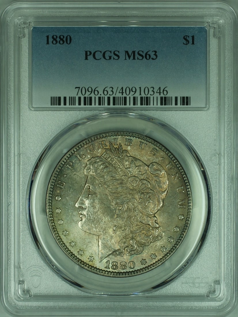 PCGS MS63 1880 Morgan Silver Dollar Toned: PCGS MS63 1880 Morgan Silver Dollar Toned This 1880 Morgan Silver Dollar was minted in Philadelphia and is certified by PCGS with an MS-63 grade. Struck in silver, this uncirculated coin features attr