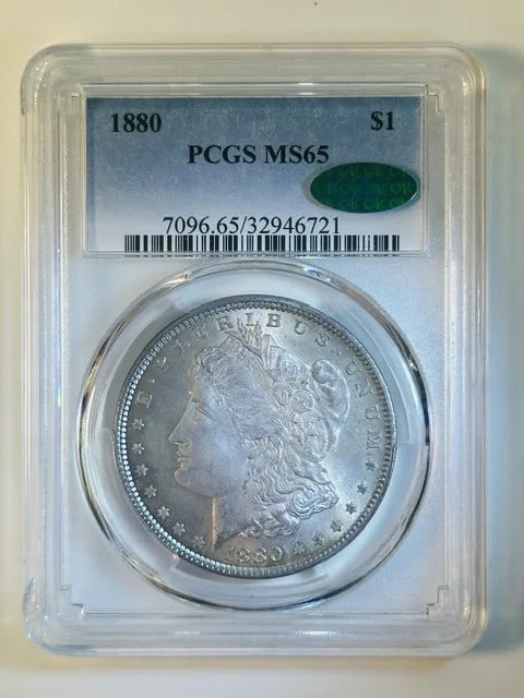 1880 Morgan Dollar PCGS MS65 CAC Silver Philadelphia: 1880 Morgan Dollar PCGS MS65 CAC Silver Philadelphia This 1880 Morgan Silver Dollar was minted in Philadelphia and is graded MS-65 by PCGS, with additional CAC certification. Struck in silver, this pr