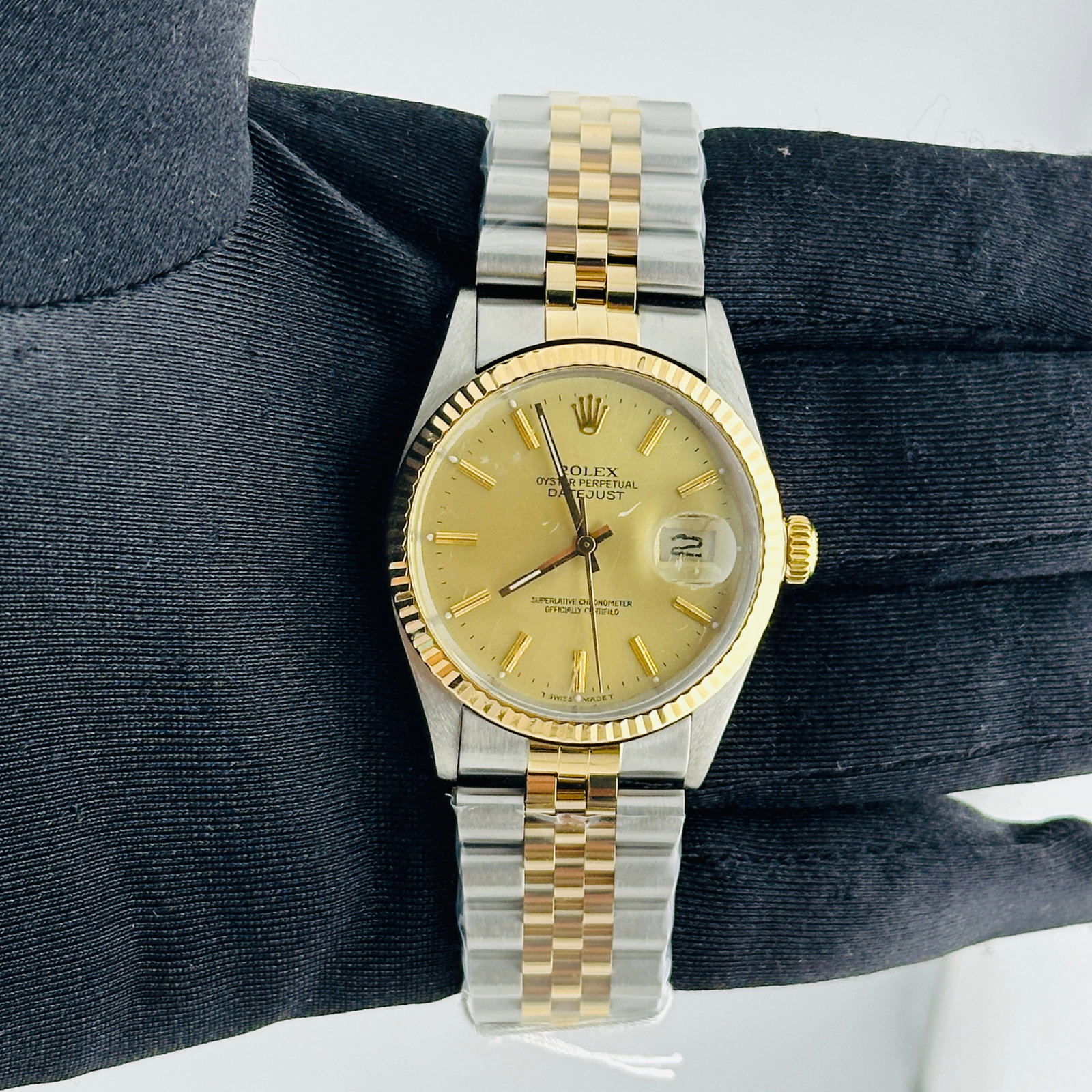 Champagne Stick Dial for Rolex Datejust Reference 16013 Aftermarket Jubilee: Champagne Stick Dial for Rolex Datejust Reference 16013 Aftermarket Jubilee This men's Rolex Datejust watch features a champagne stick dial, a fluted bezel, and is fitted with an Aftermarket Jubilee b