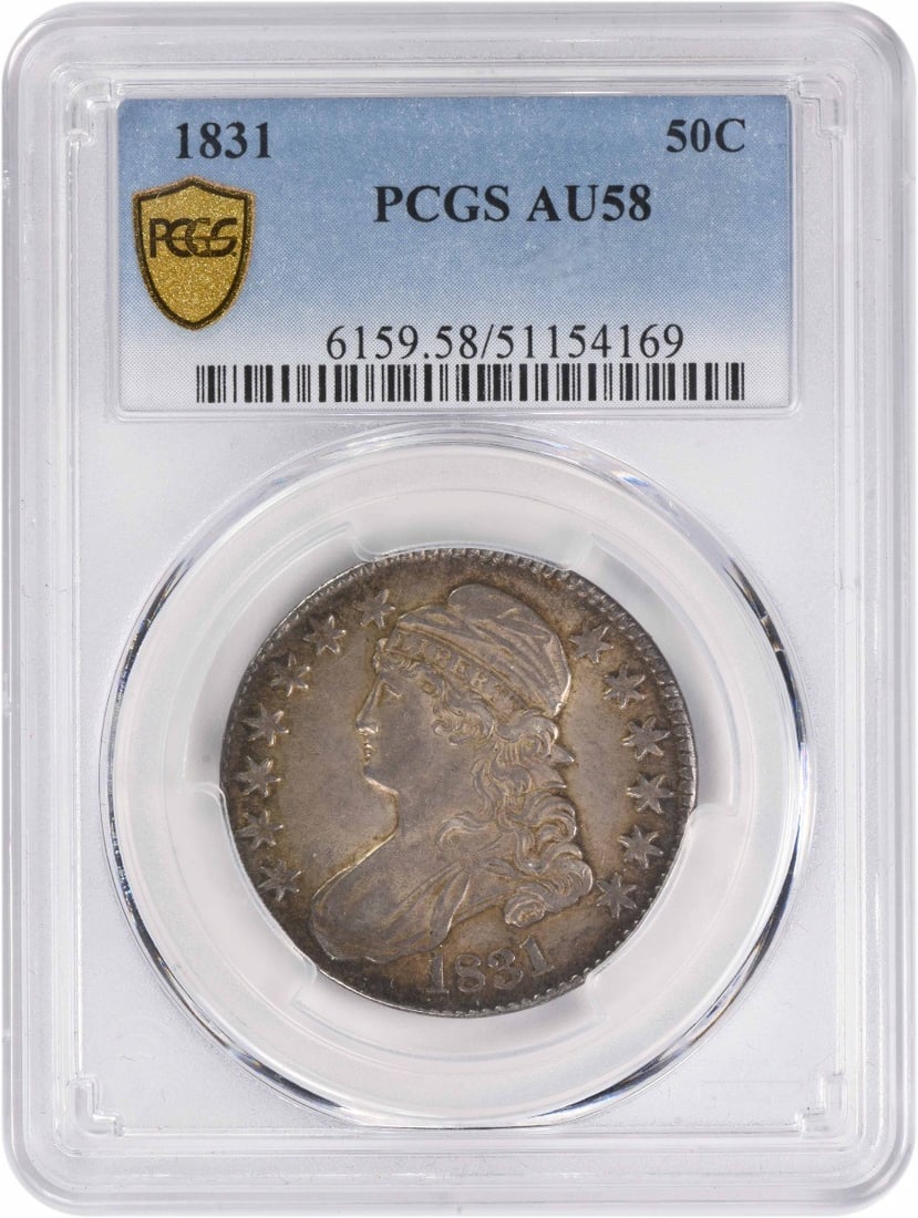 1831 Bust Silver Half Dollar AU58 Certified PCGS 50C: 1831 Bust Silver Half Dollar AU58 Certified PCGS 50C This 1831 Bust Silver Half Dollar, graded AU58 by PCGS, is a remarkable piece of American numismatic history. Struck at the Philadelphia Mint, this