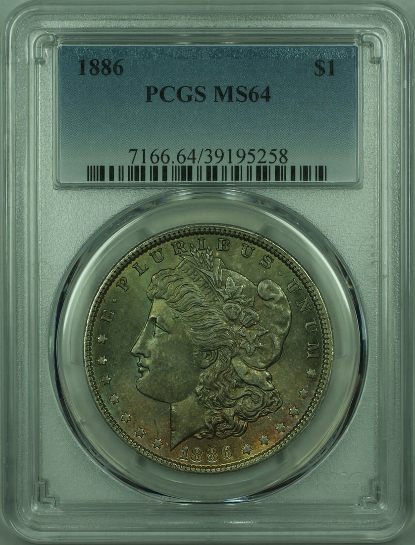 PCGS MS64 1886 Morgan Silver Dollar Toned: PCGS MS64 1886 Morgan Silver Dollar Toned This 1886 Morgan Silver Dollar is graded MS-64 by PCGS, indicating a high-quality, uncirculated coin with beautiful toning. Minted in Philadelphia, it feature