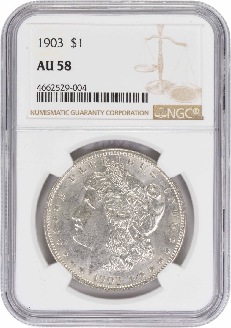 NGC AU58 1903 Morgan $1 Silver Coin: NGC AU58 1903 Morgan $1 Silver Coin 1903 Morgan Silver Dollar graded AU58 by NGC. This circulated United States coin is composed of silver and has no mint mark. It is a pre-owned example with denomina