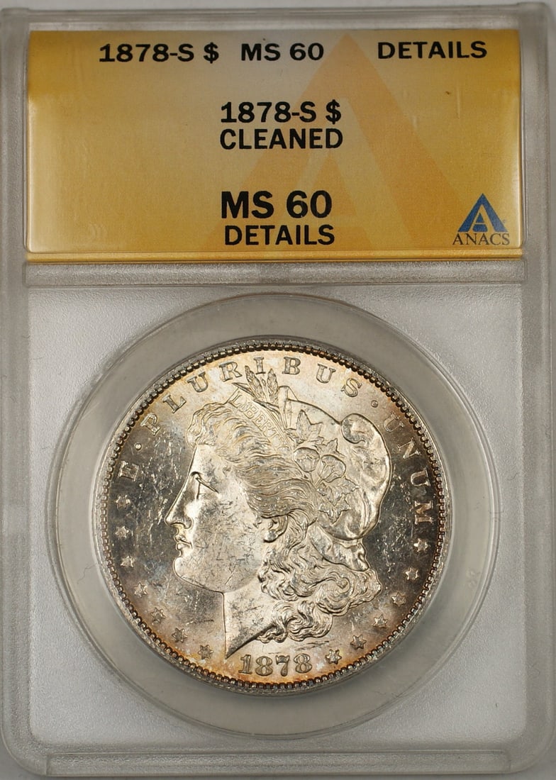 ANACS MS-60 Details 1878-S Morgan Silver Dollar Cleaned: ANACS MS-60 Details 1878-S Morgan Silver Dollar Cleaned This is a 1878-S Morgan Silver Dollar graded by ANACS as MS-60 Details and noted as having been cleaned. The coin is uncirculated and was minted