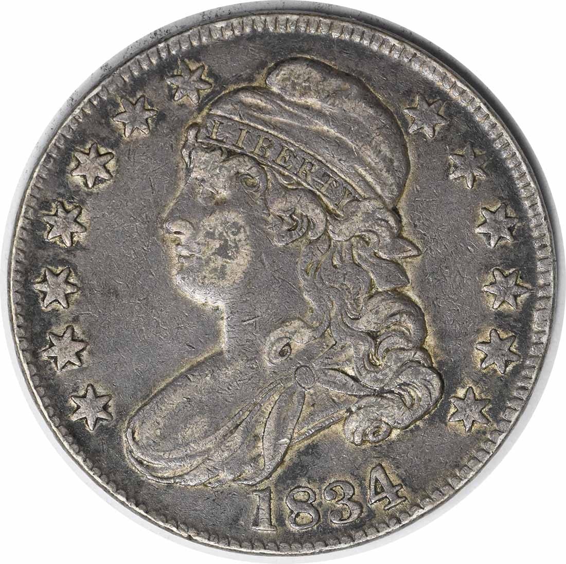 1834 Large Date Small Letters Bust Half Dollar Philadelphia Uncertified: 1834 Large Date Small Letters Bust Half Dollar Philadelphia Uncertified This is an 1834 Bust Half Dollar featuring the Large Date and Small Letters variety. The coin is circulated, uncertified, and gr