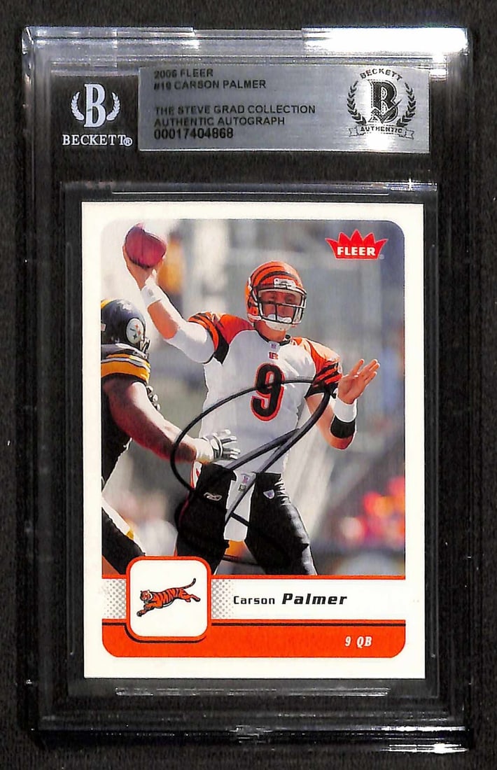 Carson Palmer Signed Bengals 2006 Fleer #10 Card Beckett Authenticated: Carson Palmer Signed Bengals 2006 Fleer #10 Card Beckett Authenticated This is a 2006 Fleer #10 sports trading card, autographed by Cincinnati Bengals Quarterback Carson Palmer. The signature is in bl