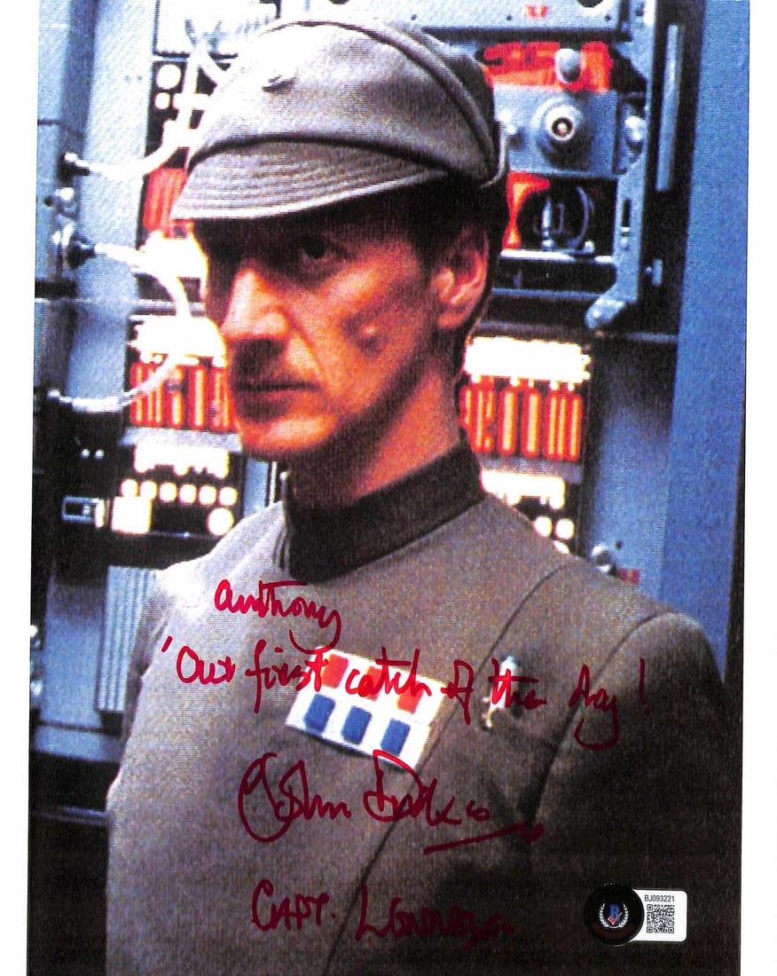 Signed 8x10 Star Wars Empire Strikes Back photo by John Dicks Beckett: Signed 8x10 Star Wars Empire Strikes Back photo by John Dicks Beckett This 8x10 color photograph from Star Wars: The Empire Strikes Back features John Dicks in his role as Captain Lennox. The photo is