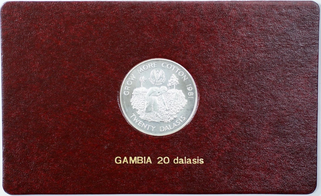 1981 Gambia 20 Dalasis Silver Coin Album Insert for FAO World Food Day: 1981 Gambia 20 Dalasis Silver Coin Album Insert for FAO World Food Day This 1981 FAO World Food Day album insert includes a Gambia 20 Dalasis coin minted in .925 silver. The coin is uncirculated and w