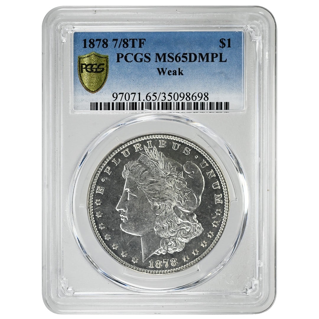 PCGS MS65DMPL 1878 Morgan Dollar 7 8TF Silver $1: PCGS MS65DMPL 1878 Morgan Dollar 7 8TF Silver $1 This 1878 Morgan Dollar features the rare 7/8 Tail Feathers variety, struck at the Philadelphia Mint. Certified by PCGS as MS65 Deep Mirror Proof-Like 