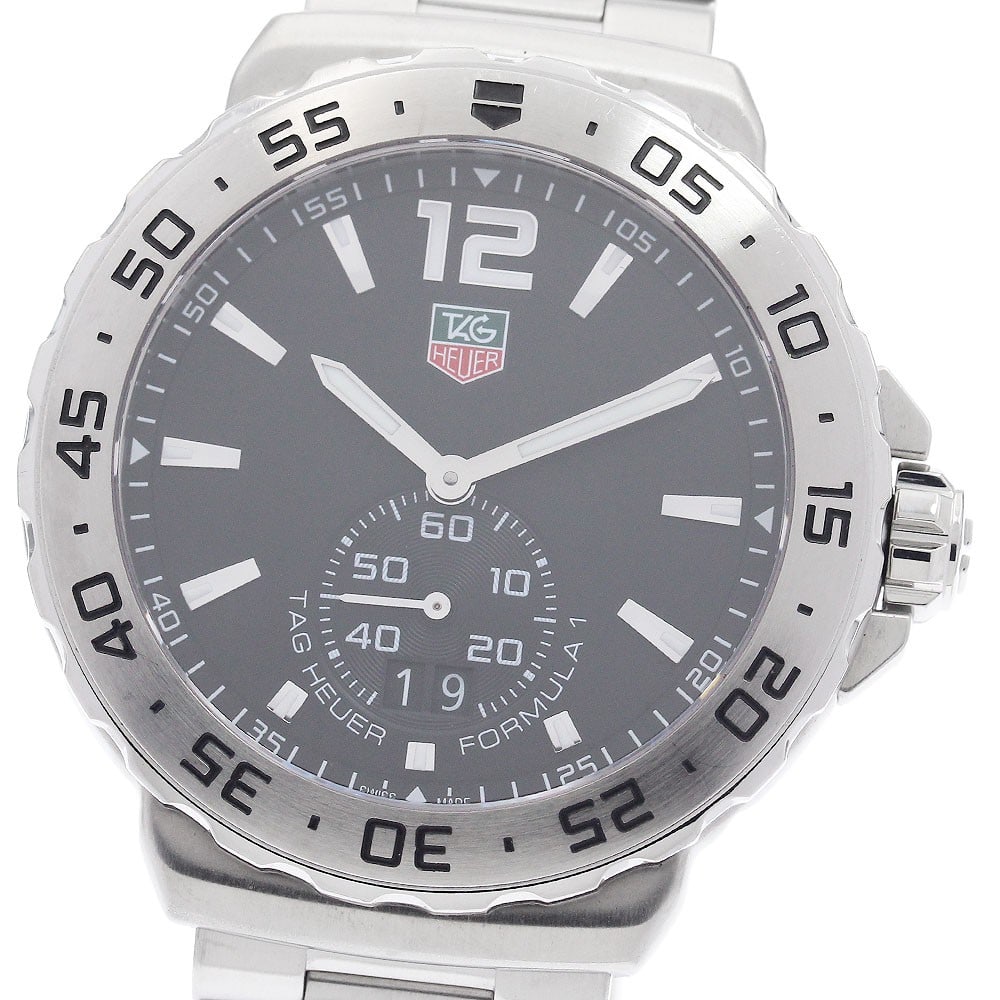 TAG Heuer Formula 1 Grand Date Quartz Stainless Steel Men's Watch: TAG Heuer Formula 1 Grand Date Quartz Stainless Steel Men's Watch This TAG Heuer Formula 1 Grand Date men's wristwatch features a stainless steel case and bracelet with a black dial. Powered by a reli