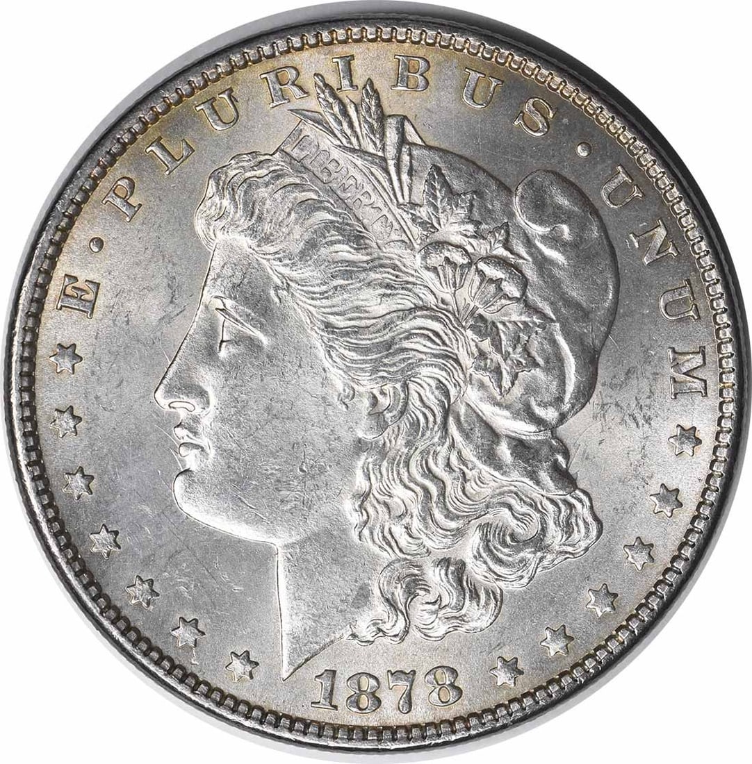 Choice BU 1878 Morgan Dollar 7 Tail Feathers Reverse 1879 Uncertified Silver Coin: Choice BU 1878 Morgan Dollar 7 Tail Feathers Reverse 1879 Uncertified Silver Coin This is an 1878 Morgan Silver Dollar featuring the 7 Tail Feathers Reverse of 1879. The coin is in choice brilliant un