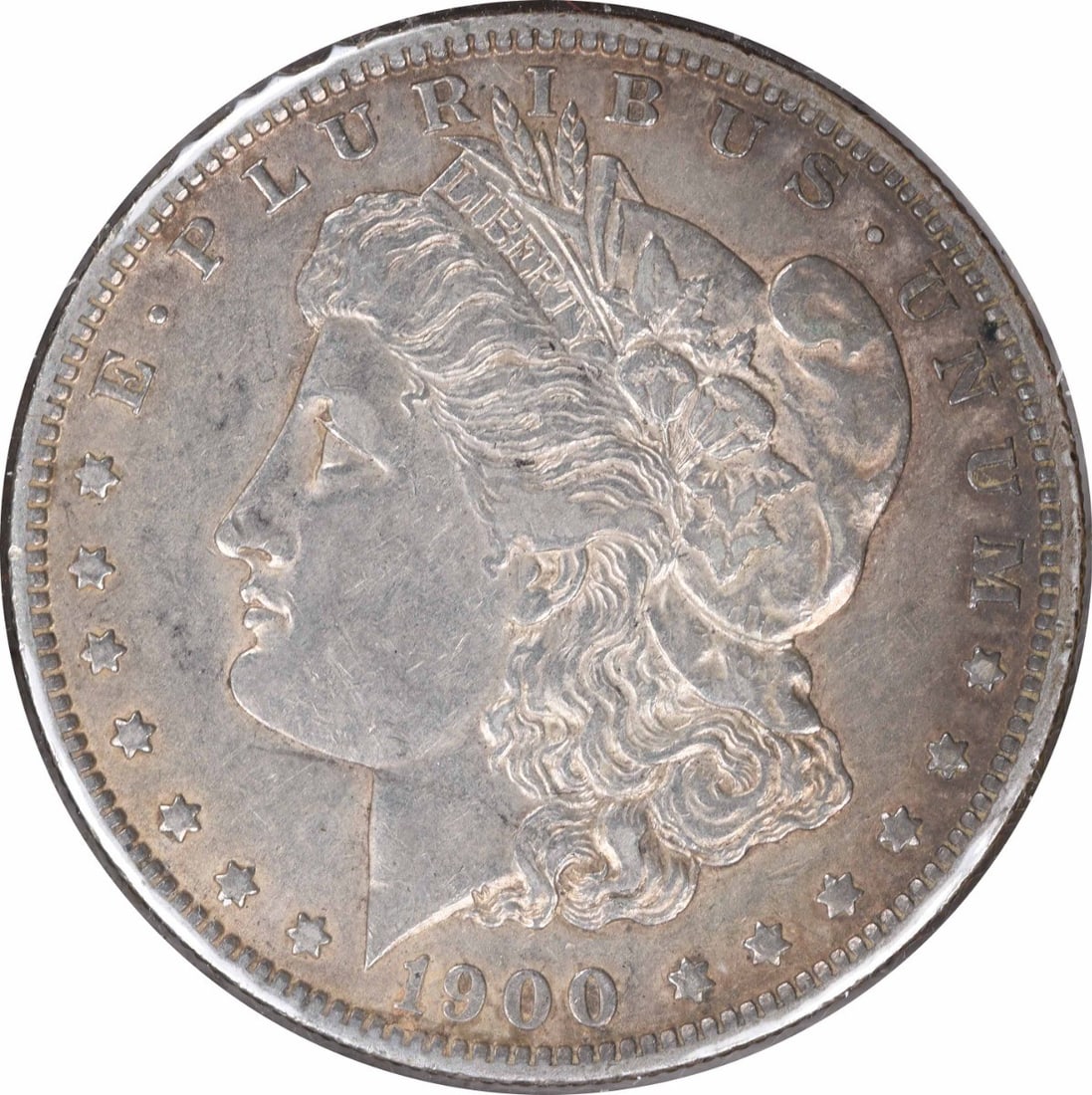 1900-O Morgan Silver Dollar Uncertified 90% Silver Coin by George T. Morgan: 1900-O Morgan Silver Dollar Uncertified 90% Silver Coin by George T. Morgan This 1900-O/CC Morgan Silver Dollar is an exquisite piece of numismatic history. Made of 90% silver and 10% copper, this coi