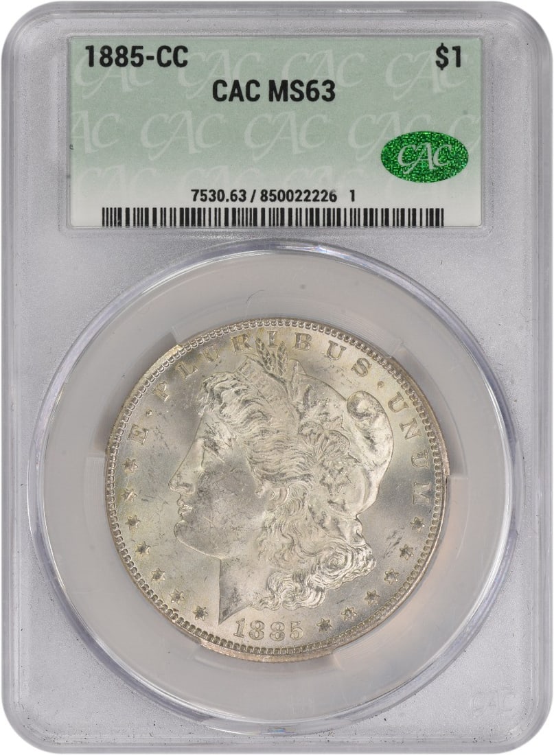 1885 Carson City Morgan Dollar Graded MS63 by CACG: 1885 Carson City Morgan Dollar Graded MS63 by CACG This 1885-CC Morgan Silver Dollar is certified MS63 by CACG. Struck at the Carson City Mint, it is composed of 90% silver and 10% copper. Designed by