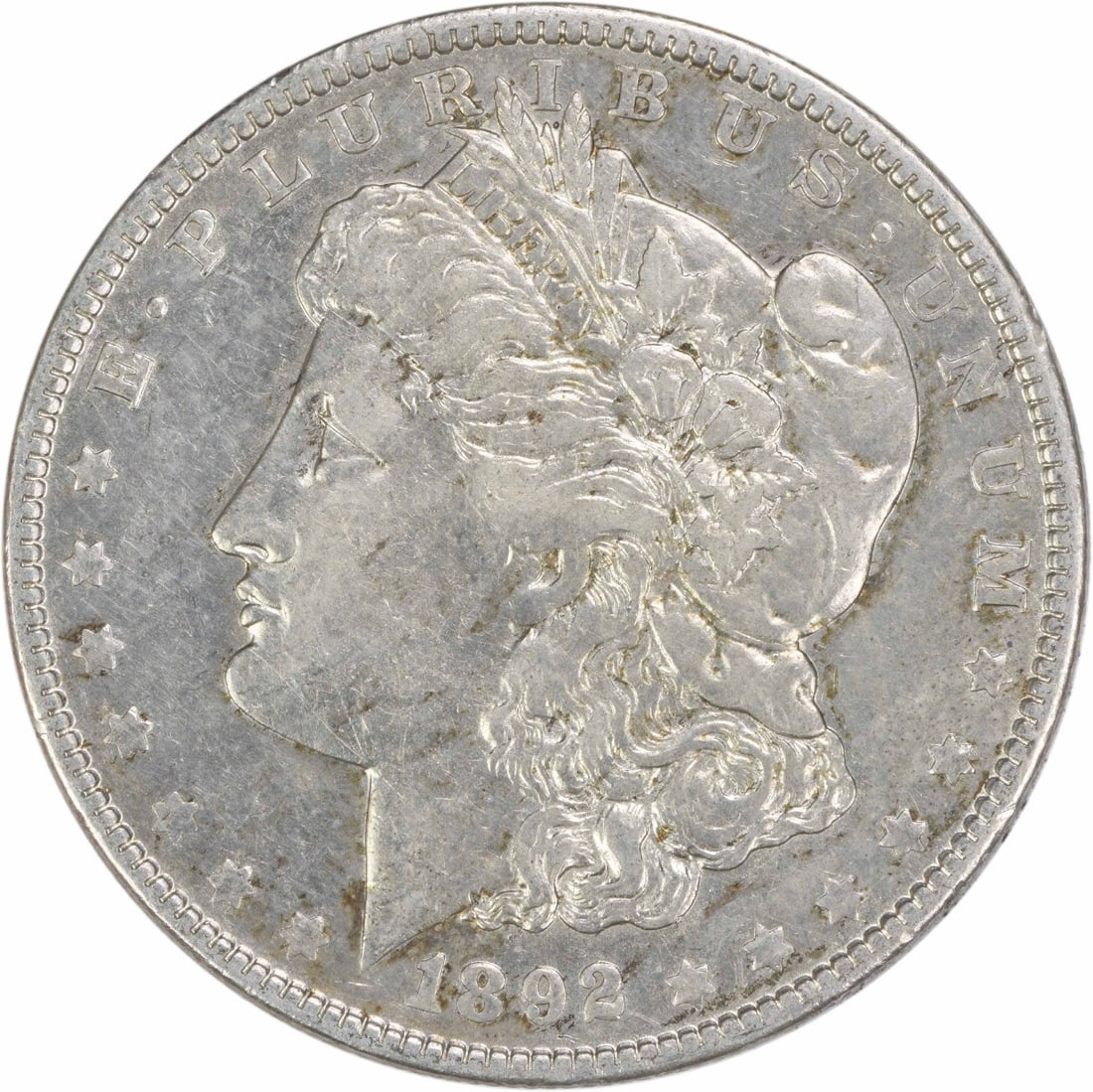 1892 New Orleans Morgan Dollar Extra Fine Uncertified Silver Coin: 1892 New Orleans Morgan Dollar Extra Fine Uncertified Silver Coin This 1892-O Morgan Silver Dollar is an Extra Fine (EF) circulated coin from the New Orleans Mint. Designed by George T. Morgan, it fea