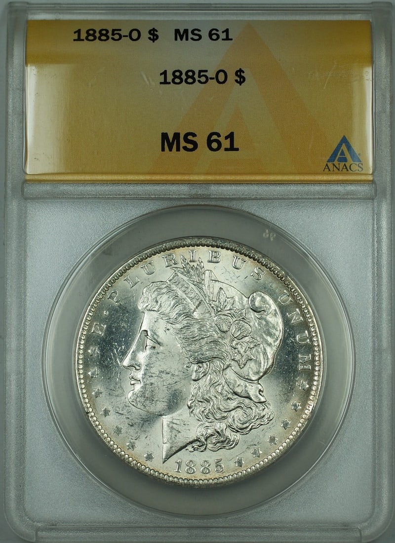 ANACS MS-61 1885-O Silver Dollar Minted in New Orleans: ANACS MS-61 1885-O Silver Dollar Minted in New Orleans This is an 1885-O Morgan Silver Dollar graded MS-61 by ANACS. Minted in New Orleans, this uncirculated coin is composed of silver and certified b