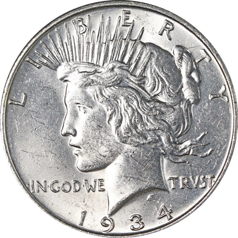 United States 1934 Denver Mint Silver Peace Dollar Coin: United States 1934 Denver Mint Silver Peace Dollar Coin This 1934-D Peace Dollar is a silver coin minted in Denver, United States. It is a circulated, pre-owned item with a silver composition and a fi