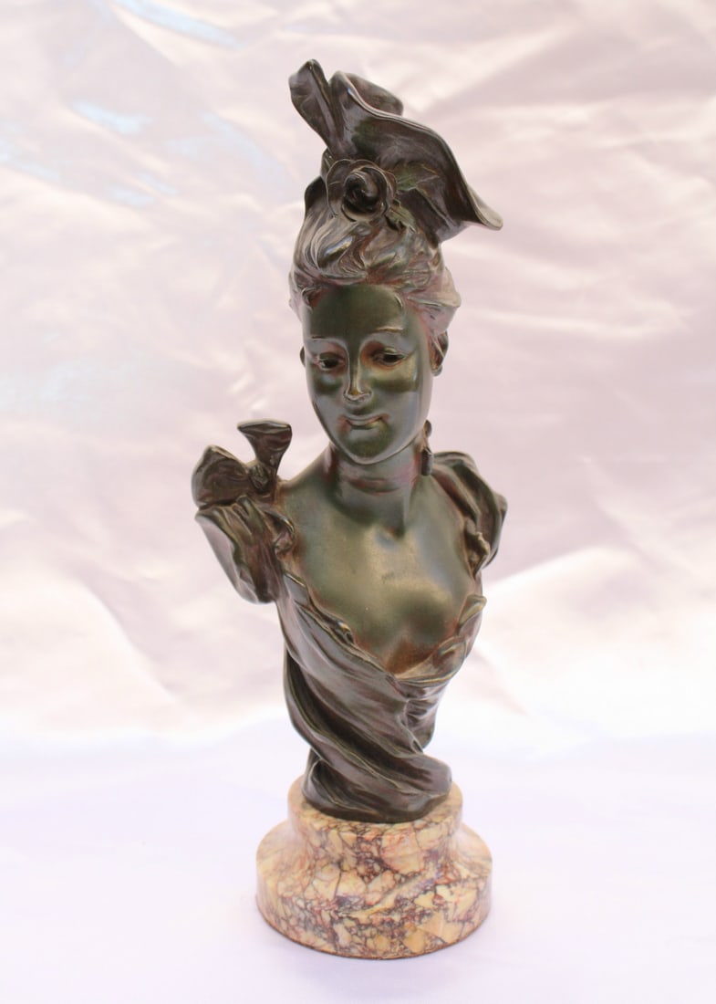 19th Century French Art Nouveau Bronze Bust on Marble Signed: 19th Century French Art Nouveau Bronze Bust on Marble Signed This exquisite late 19th century French Art Nouveau bust captures the essence of a young girl in intricately patinated bronze. The piece sh
