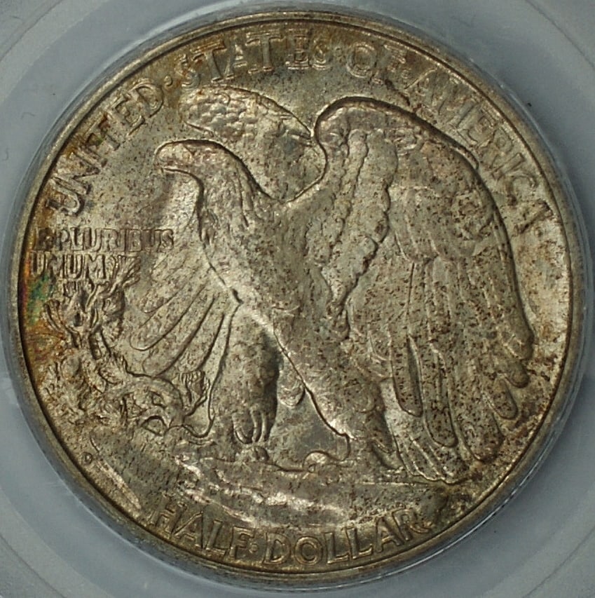 PCGS MS-65 1946-D Silver Half Dollar with Reverse Toning: PCGS MS-65 1946-D Silver Half Dollar with Reverse Toning This 1946-D Walking Liberty Silver Half Dollar is certified by PCGS with a grade of MS-65. The coin features reverse toning and was minted in D