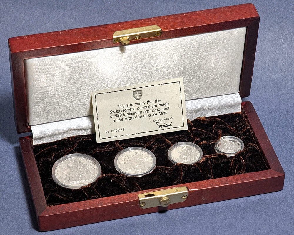 1988 Swiss Helvetia Platinum Proof Set 4 Coins Lion 1.85 APW OGP COA: 1988 Swiss Helvetia Platinum Proof Set 4 Coins Lion 1.85 APW OGP COA This is an original 1988 Swiss Helvetia 4 Coin Proof Platinum Set featuring the Lion design. The set contains four proof coins mint