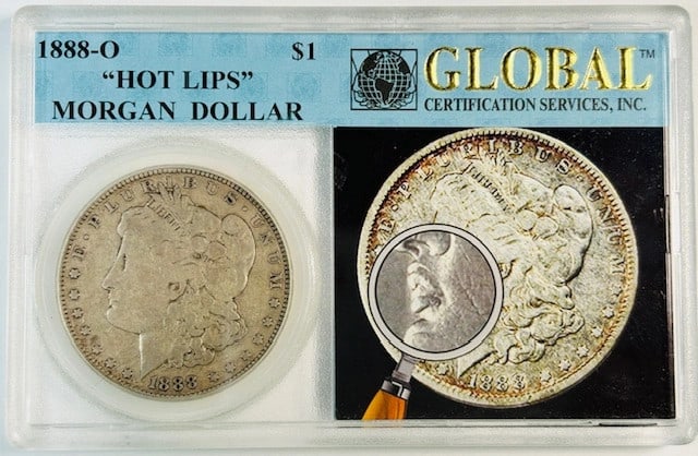 Hot Lips 1888 O Morgan Silver Dollar in Global Holder: Hot Lips 1888 O Morgan Silver Dollar in Global Holder This is a pre-owned 1888 O Morgan Silver Dollar featuring the notable "Hot Lips" variety. Struck in New Orleans, this collectible coin is composed