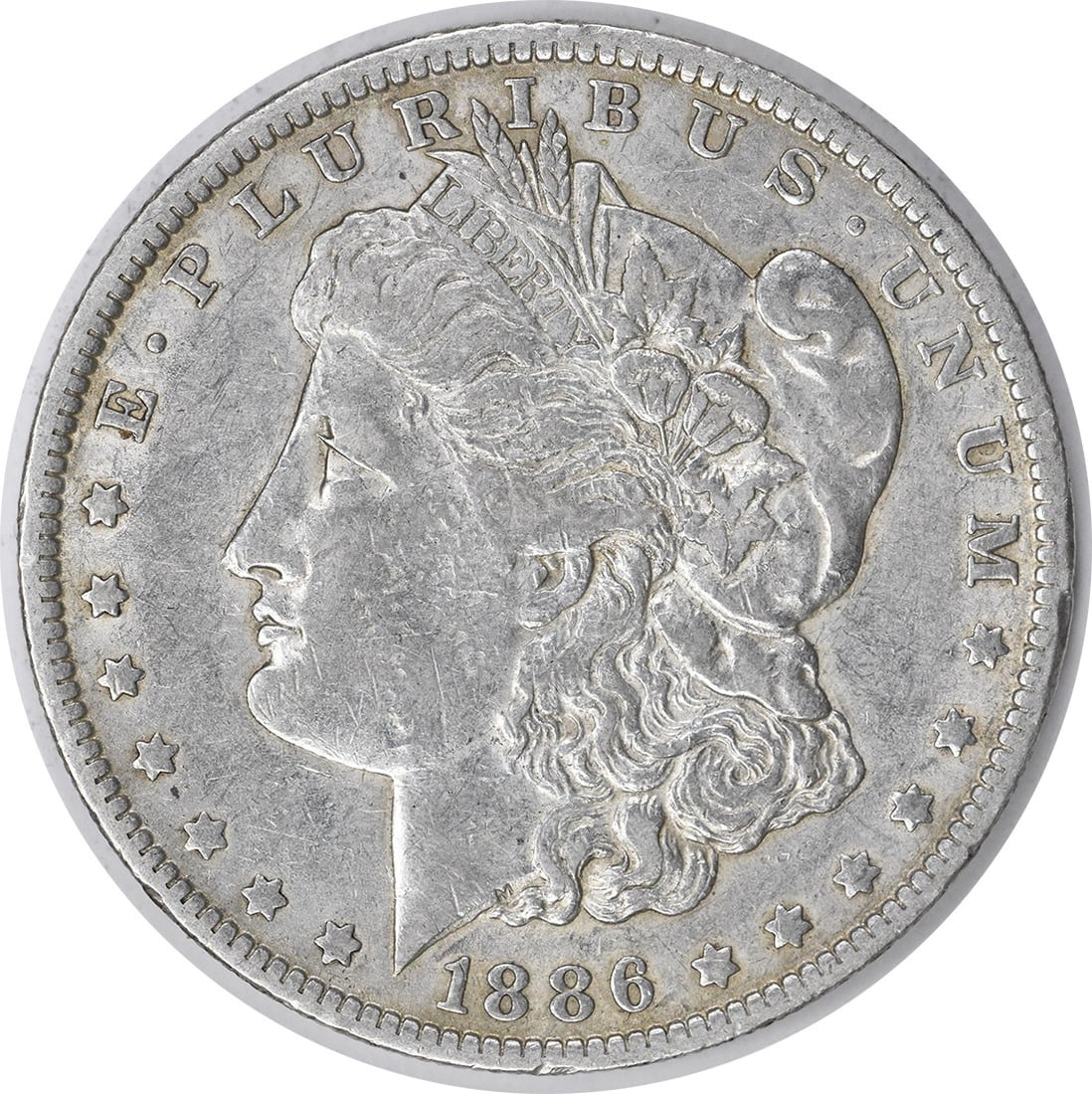 1886-O Morgan Silver Dollar 90% Silver XF George T. Morgan: 1886-O Morgan Silver Dollar 90% Silver XF George T. Morgan This 1886-O Morgan Silver Dollar is a beautiful piece with a rich history. It features a design by George T. Morgan and was minted in New Orl