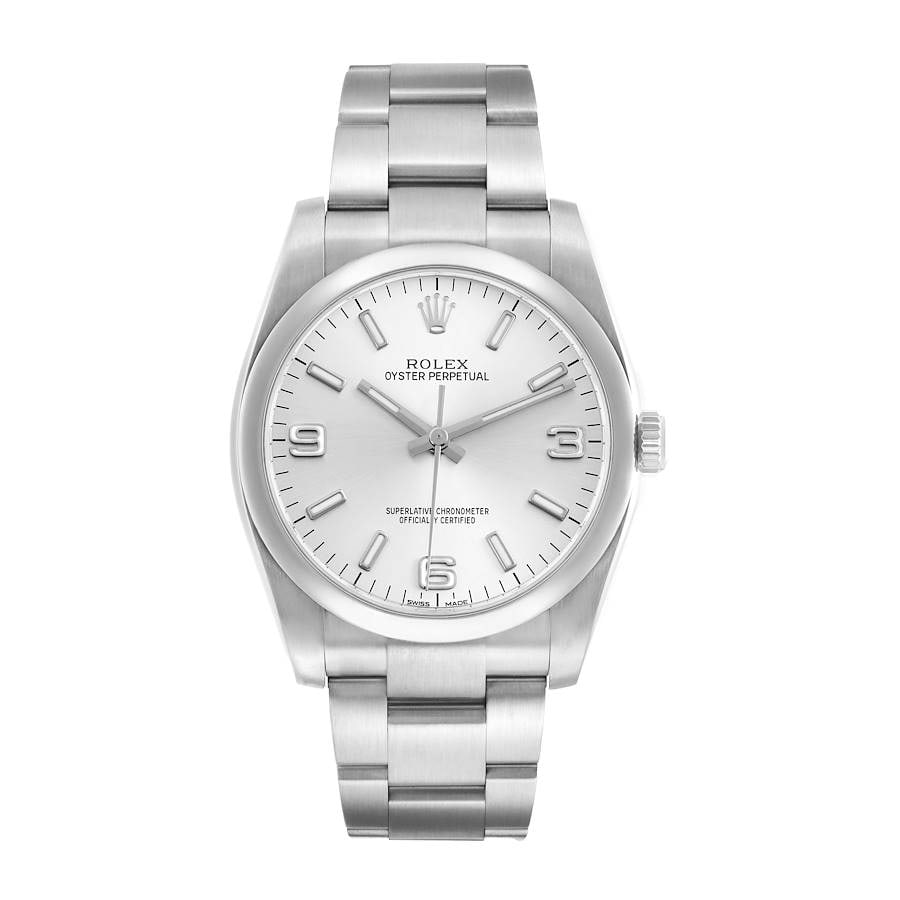 Rolex Oyster Perpetual Silver Dial 116000 Watch with Card 2013: Rolex Oyster Perpetual Silver Dial 116000 Watch with Card 2013 This Rolex Oyster Perpetual features a silver dial and a smooth bezel, complemented by the iconic Oyster bracelet. The watch is a men's m