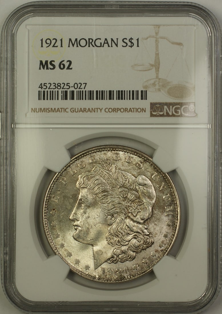 NGC MS62 1921 Morgan Dollar Silver Coin Lightly Toned Philadelphia Mint: NGC MS62 1921 Morgan Dollar Silver Coin Lightly Toned Philadelphia Mint This is a 1921 Morgan Silver Dollar $1 coin, certified by NGC with a grade of MS-62. The coin is lightly toned and remains in un