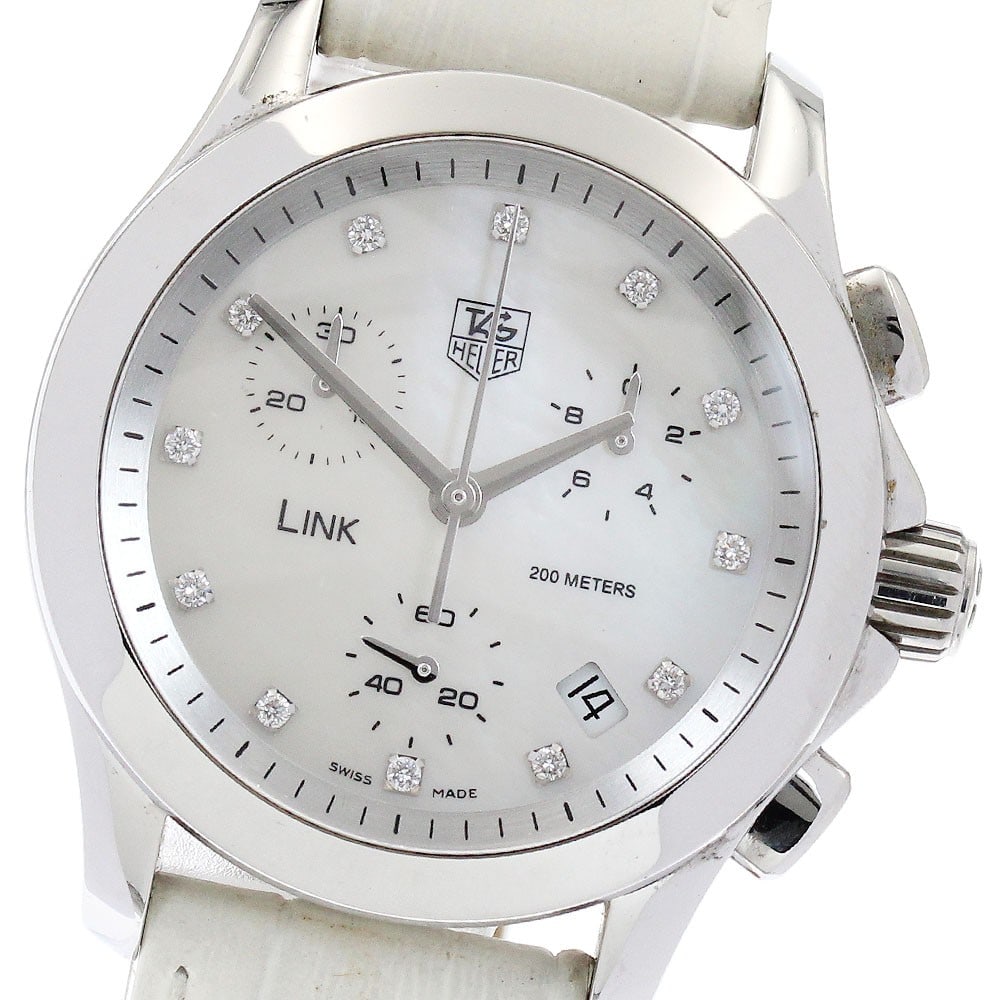 TAG Heuer Link women's quartz chronograph date watch: TAG Heuer Link women's quartz chronograph date watch This TAG Heuer Link Chronograph Date Quartz women's wristwatch features a stainless steel case paired with a white shell dial and a leather strap. 