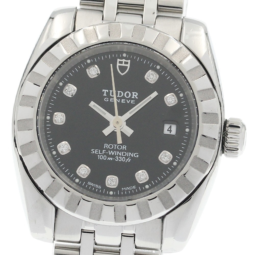 TUDOR Classic Date Women's Automatic Watch 10 Diamond: TUDOR Classic Date Women's Automatic Watch 10 Diamond This is a pre-owned TUDOR Classic Date women's wristwatch featuring an automatic movement. The watch is adorned with 10 diamond hour markers, comb