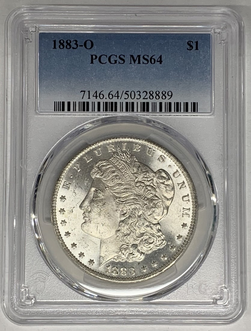 PCGS MS 64 1883-O Morgan Dollar Silver Coin United States: PCGS MS 64 1883-O Morgan Dollar Silver Coin United States This is an 1883-O Morgan Silver Dollar graded MS 64 by PCGS. The coin is uncirculated and composed of silver, originating from the United Stat