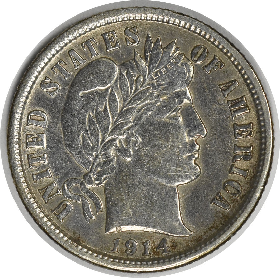 1914-D/D Barber Silver Dime AU 10C Denver Mint Uncertified: 1914-D/D Barber Silver Dime AU 10C Denver Mint Uncertified This 1914-D/D Barber Silver Dime is a remarkable piece of numismatic history, featuring a grade of AU (Almost Uncirculated). Struck at the De
