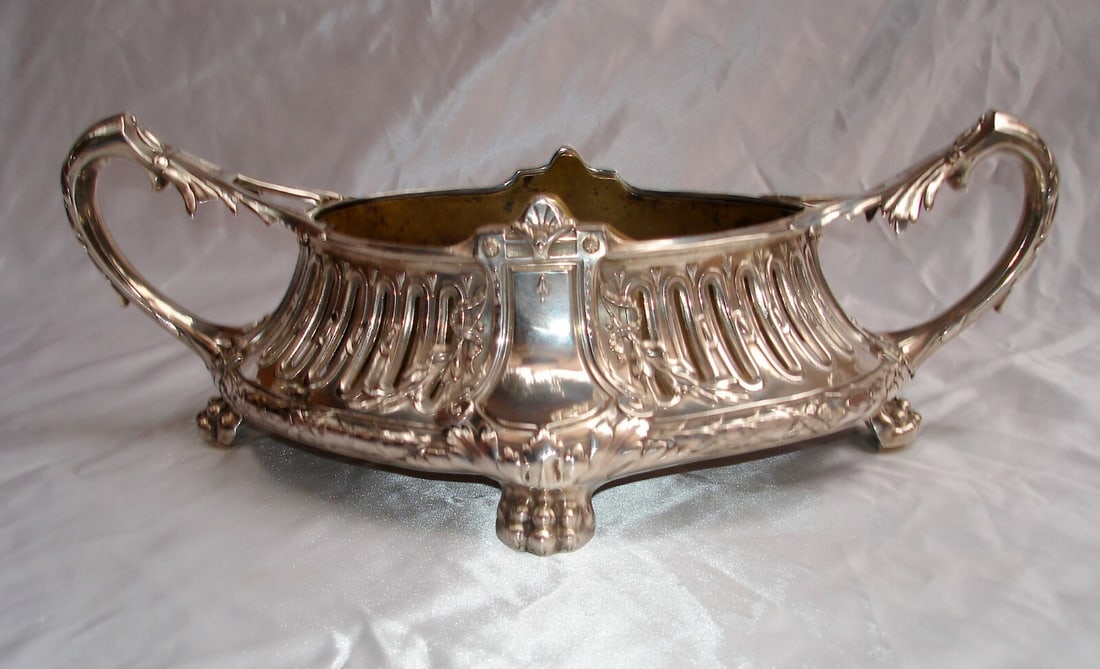 19th Century German 800 Silver Jardiniere Centerpiece with Metal Insert: 19th Century German 800 Silver Jardiniere Centerpiece with Metal Insert This exquisite 19th-century German jardiniere center piece is crafted from 800 silver and features a metal insert. It showcases 