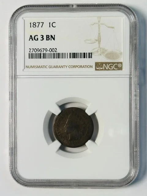 NGC AG-3 BN 1877 Indian Head Cent Key Date: NGC AG-3 BN 1877 Indian Head Cent Key Date 1877 Indian Head Small Cent, certified by NGC and graded AG 3 BN. This copper cent is a pre-owned U.S. coin from 1877, identified as a key date issue. The ce
