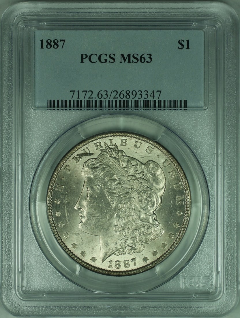 PCGS MS63 1887 Morgan Dollar Silver Coin Philadelphia Mint: PCGS MS63 1887 Morgan Dollar Silver Coin Philadelphia Mint This 1887 Morgan Silver Dollar is graded MS63 by PCGS and was minted in Philadelphia. The coin is uncirculated and composed of silver, with a
