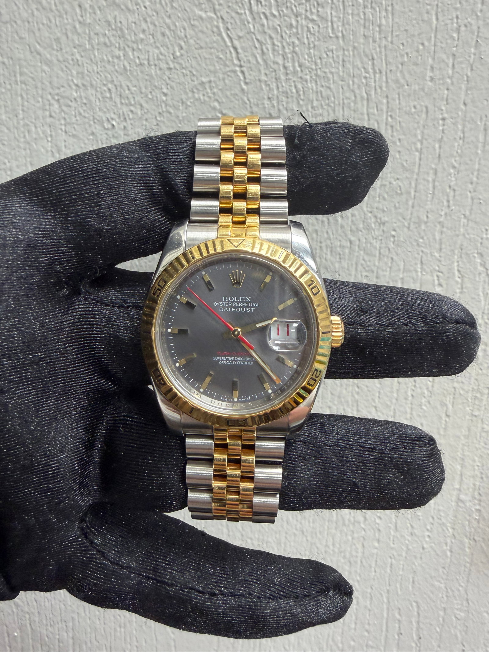Rolex Men's Datejust Turn-o-graph 116263 Watch with Grey Stick Dial and Jubilee Bracelet: Rolex Men's Datejust Turn-o-graph 116263 Watch with Grey Stick Dial and Jubilee Bracelet This is a men's Rolex Datejust watch featuring a grey stick dial and a Jubilee bracelet. The watch has a Turn-o