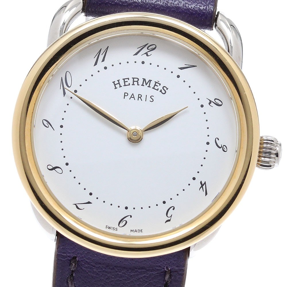 Hermes Arceau Quartz Womens Wristwatch: Hermes Arceau Quartz Womens Wristwatch This pre-owned Hermes Arceau AR5.220a is a sophisticated quartz wristwatch designed for women. Crafted in Switzerland, it reflects the renowned quality and elega