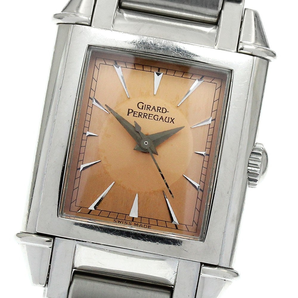 Girard Perregaux Vintage manual wind women's wristwatch 2590 stainless steel: Girard Perregaux Vintage manual wind women's wristwatch 2590 stainless steel This Girard Perregaux 2590 vintage women's wristwatch features a stainless steel case and bracelet with an orange dial. The