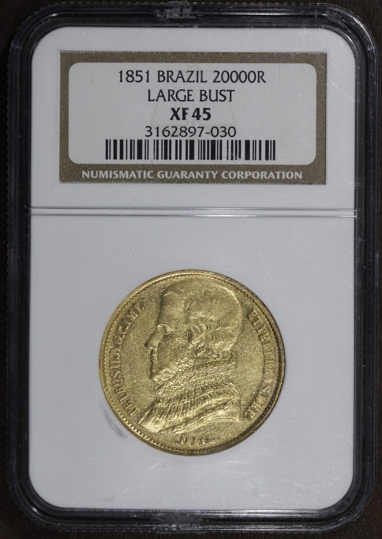 Brazil 1851 Gold 20000 Reis NGC XF45 Large Bust: Brazil 1851 Gold 20000 Reis NGC XF45 Large Bust This 1851 Brazil 20000 Reis gold coin features the large bust design and is graded XF 45 by NGC. The coin is composed of gold and is a pre-owned collect