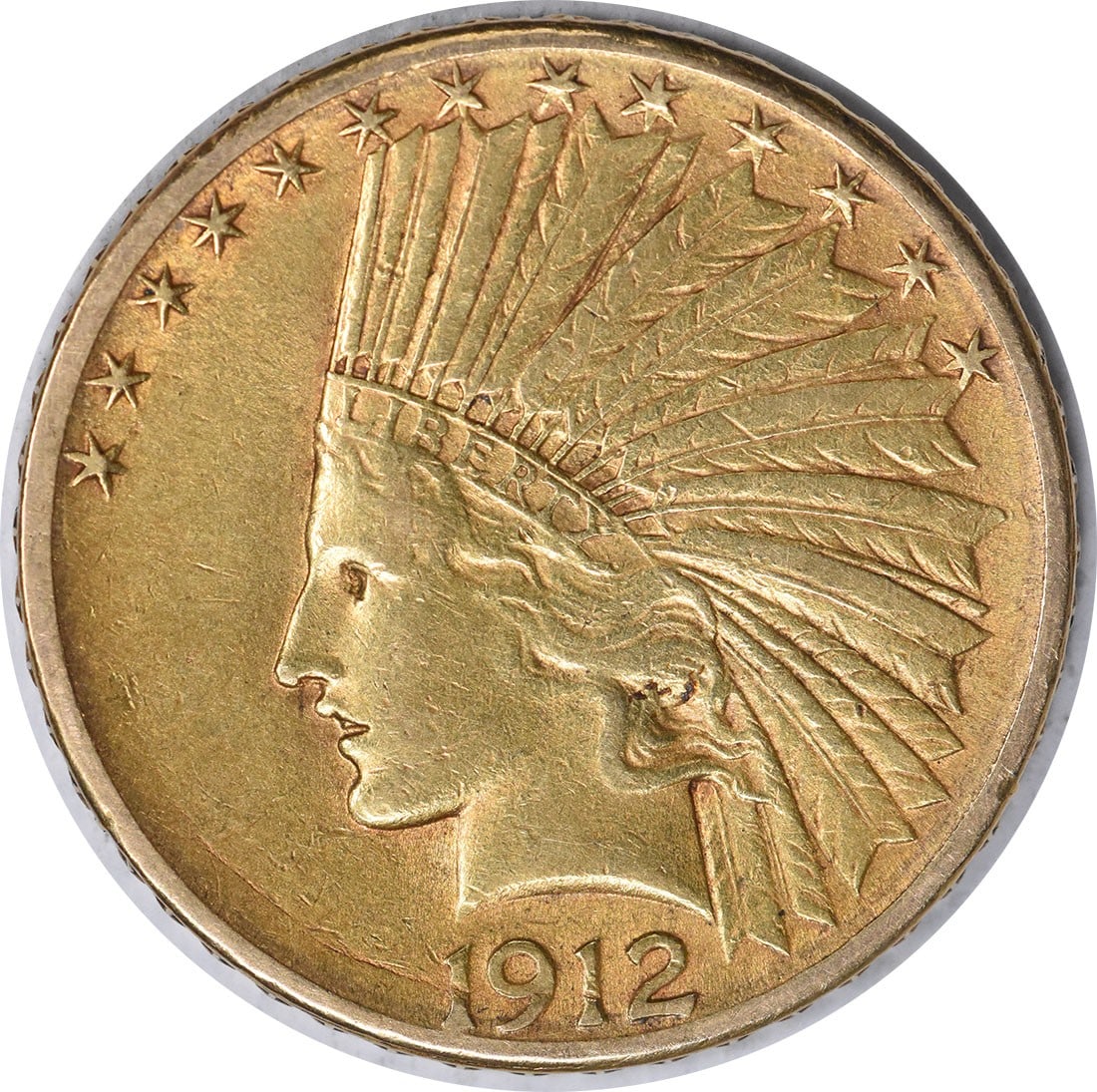 1912-S $10 Gold Indian Coin by Augustus Saint Gaudens XF Uncertified: 1912-S $10 Gold Indian Coin by Augustus Saint Gaudens XF Uncertified This 1912-S $10 Gold Indian coin is a remarkable piece of American numismatic history. Designed by Augustus Saint Gaudens, the coin